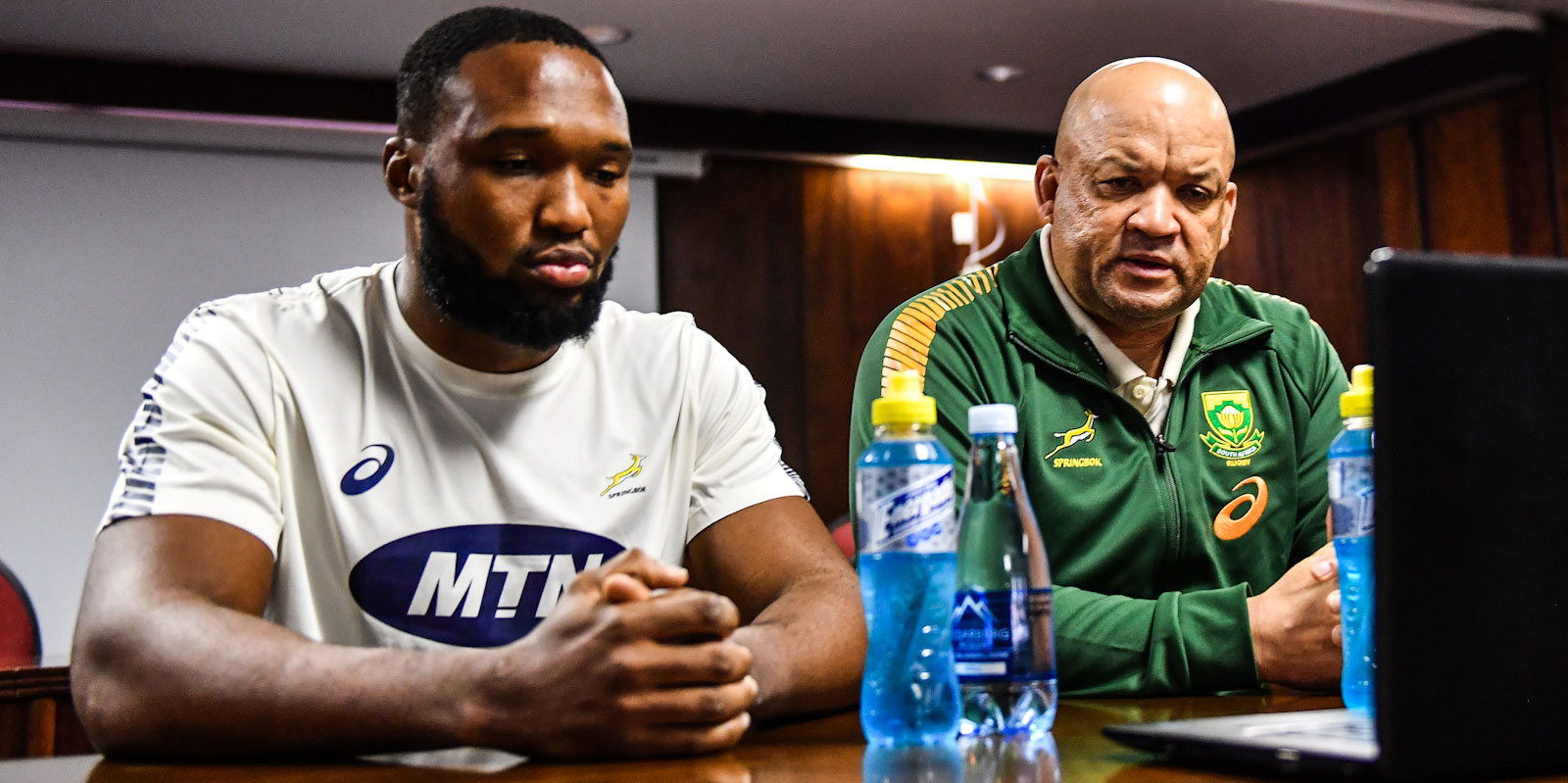 Gold captain and coach, Lukhanyo Am (left) and Deon Davids, "face" the media.