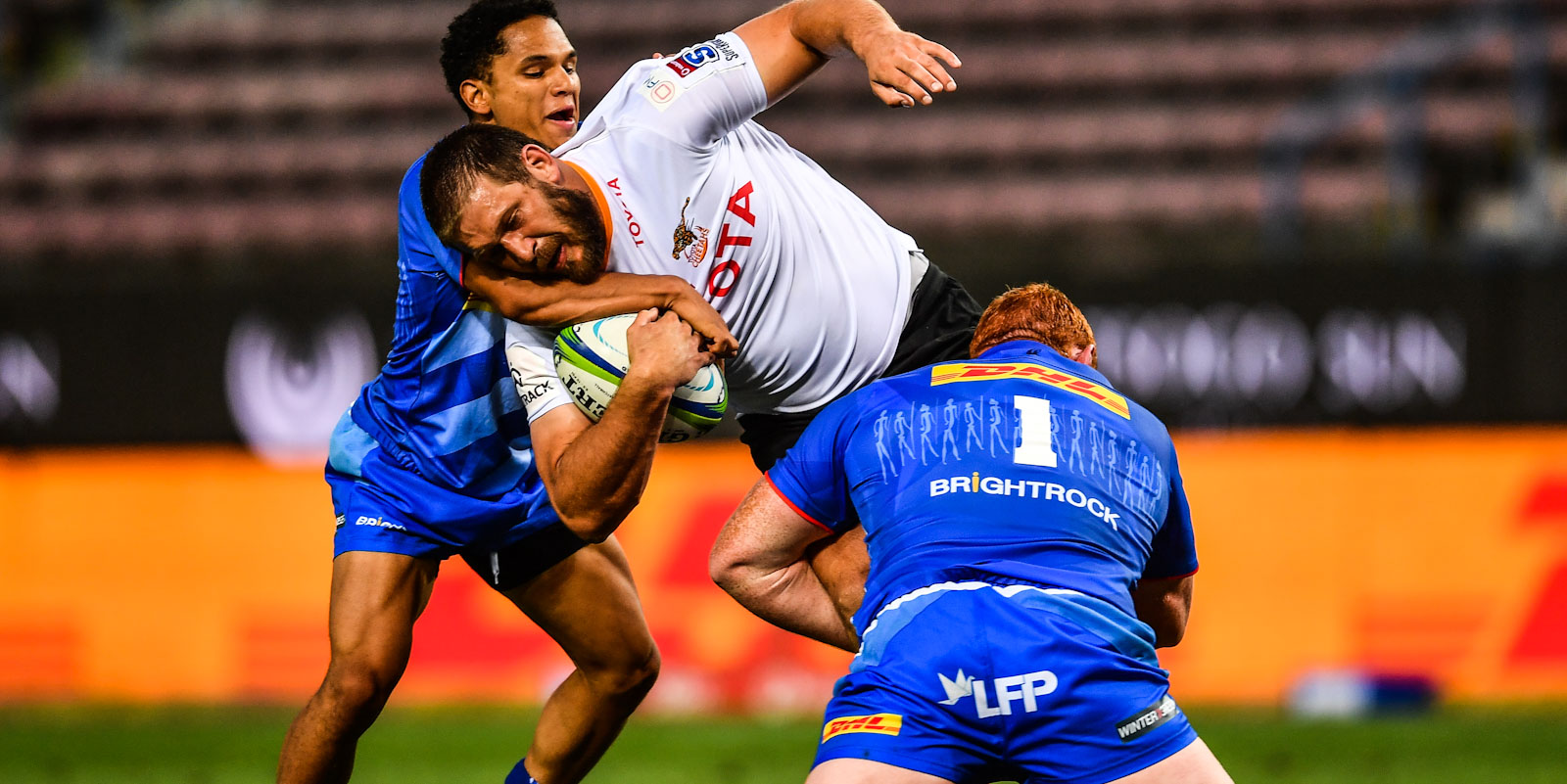 Frans Steyn is tackled by Steven Kitshoff (#1) and Herschel Jantjies