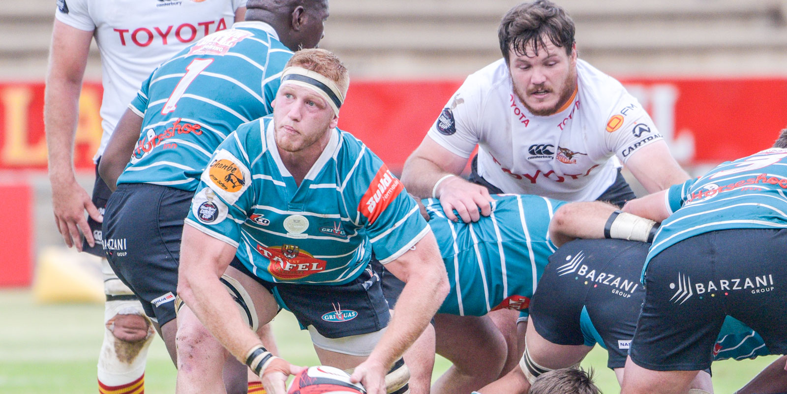 Johan Momsen starts an attack for Tafel Lager Griquas.