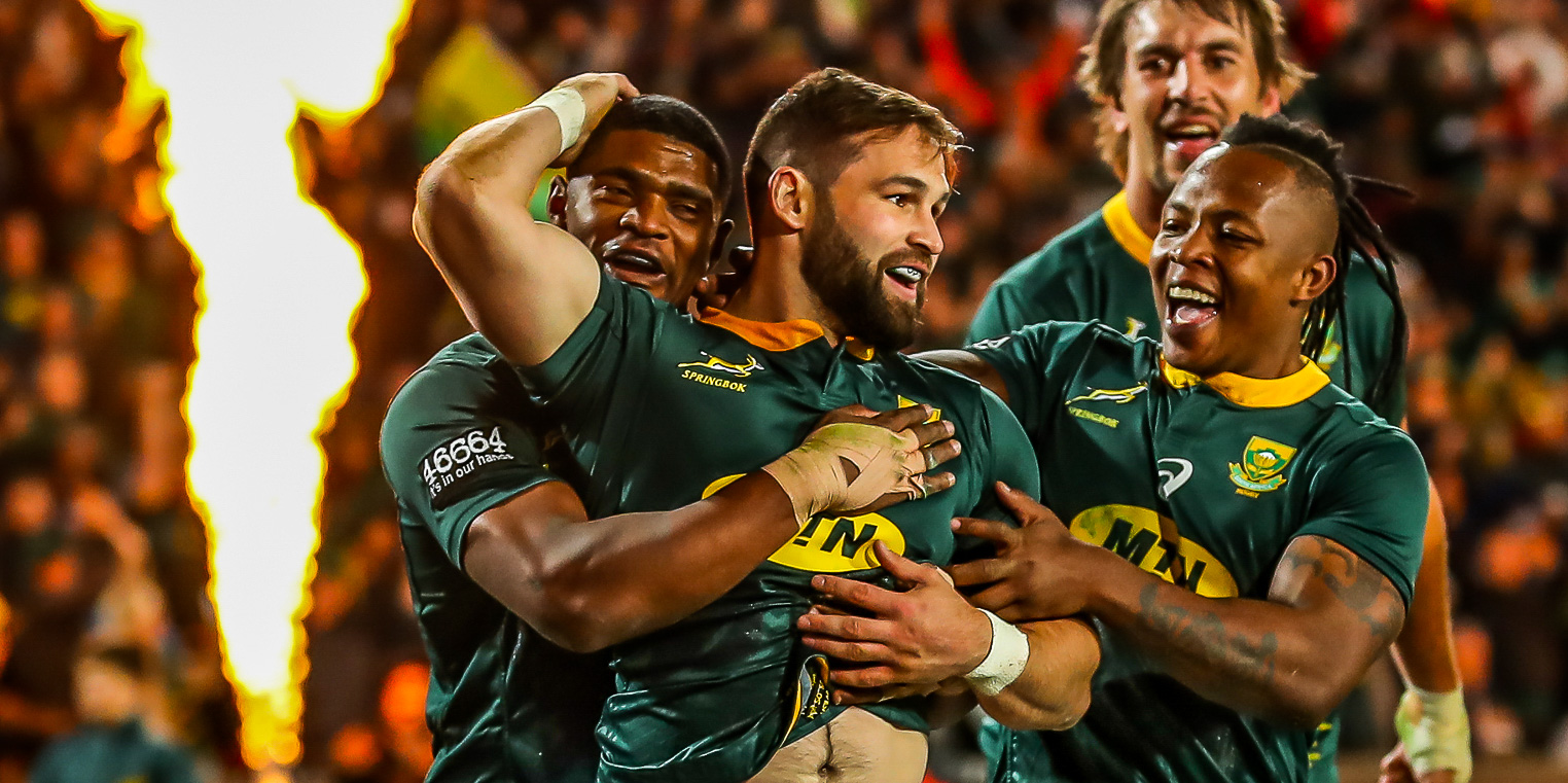 Cobus Reinach celebrates with Springbok team-mates after scoring against Australia in 2019.
