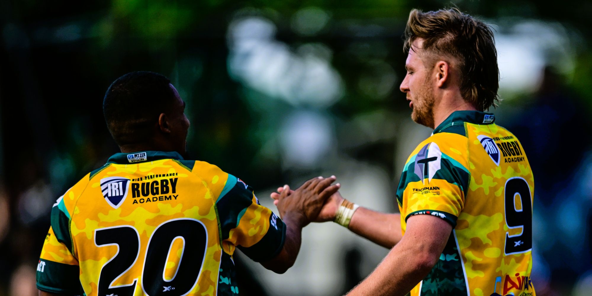 Naka Bulls' Jack Hart celebrates with Ethan Williams after scoring his try.
