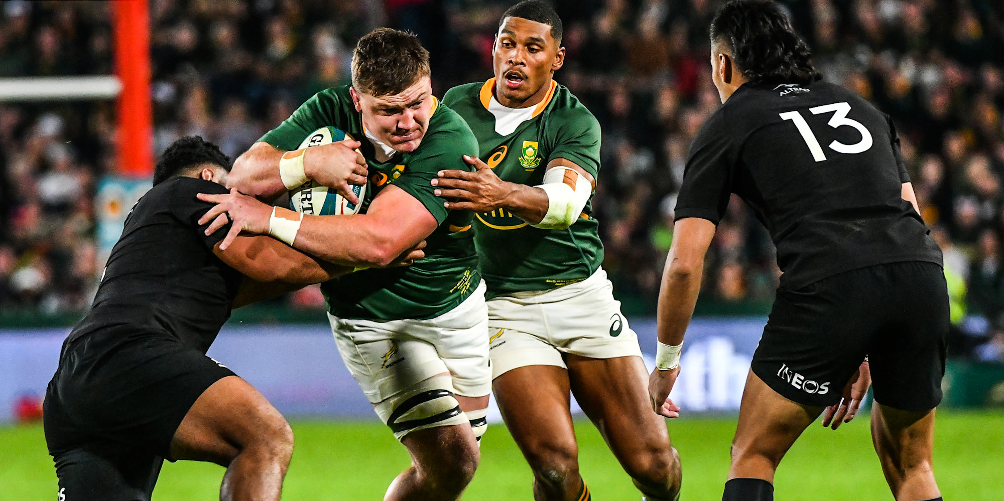 Jasper Wiese on the charge against NZ, with Damian Willemse in support.